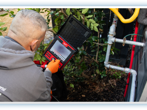 Technician repairing drain